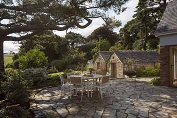 The patio-area is slightly shaded, providing the perfect place to spark up the barbecue and dine al fresco in this superb spot.