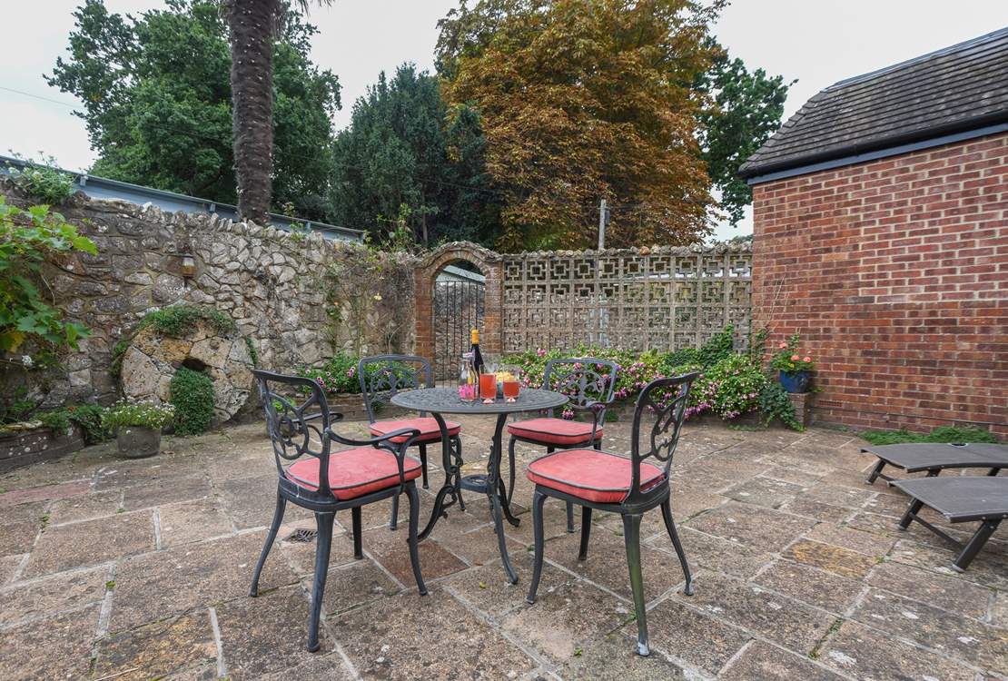 The rear patio is totally secure and private, ideal for sunbathing.