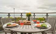 The spacious balcony has a barbecue for those wonderful summer evenings.