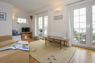 There's no need to watch the television when you can admire the sea view.