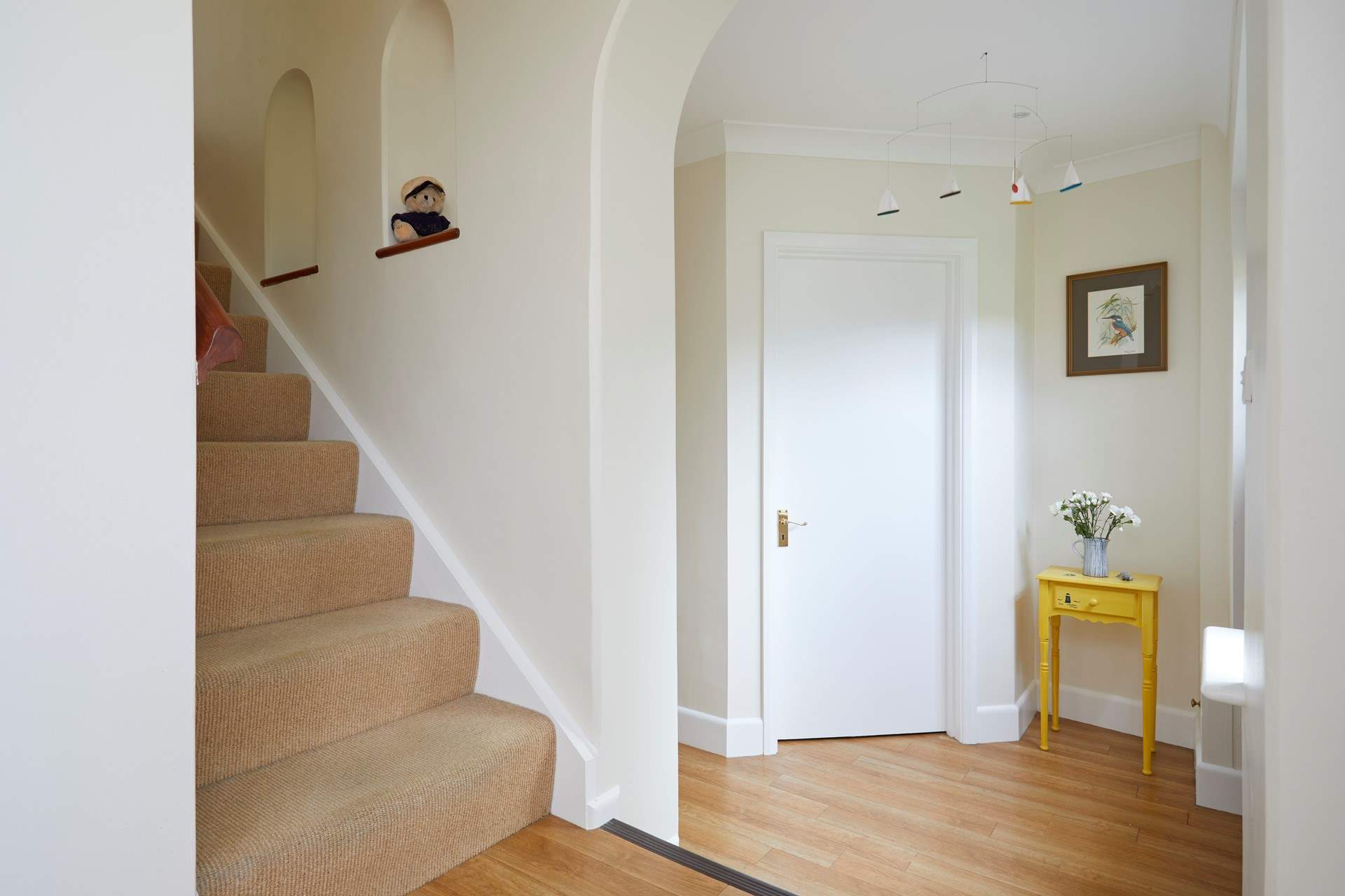 Stairs lead from the ground floor to the first floor living area. 