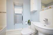 Rinse those salty toes in the en suite bathroom.