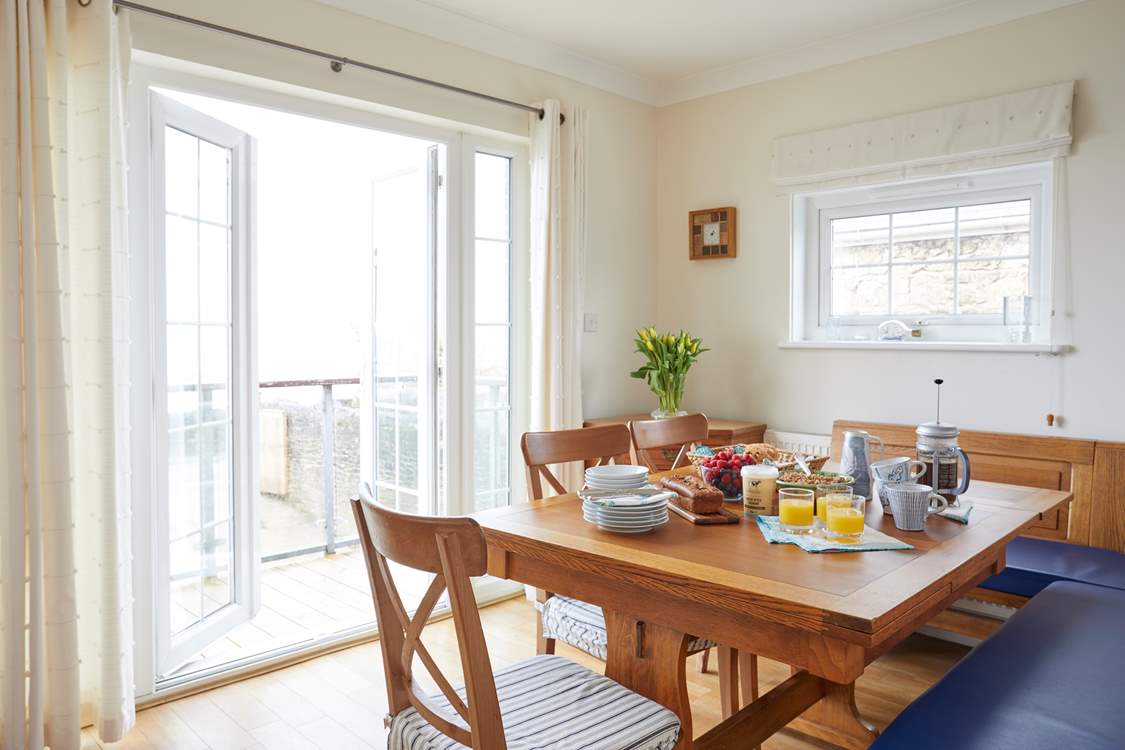 Gather everyone around the table to chat about the day ahead.