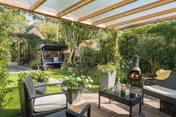 Light the chiminea and enjoy the long summer evenings. There is also a gate that opens to the garden, a great place for those muddy boots or wet wetsuits.