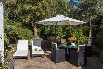 The garden catches the sun throughout the day.