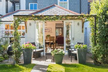 Looking from the garden to the sun-room and the rest of the house, what a spot.