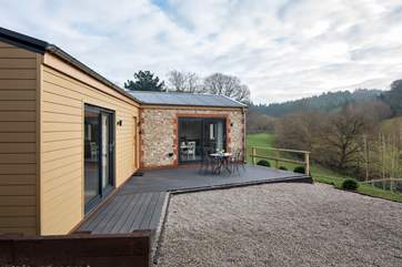 Cider Barn has a lovely view across the valley, the enclosed garden has a stock fence to keep little ones and dog safe.