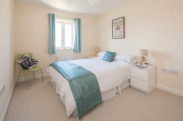 The master bedroom with en suite shower-room is light, airy and spacious.