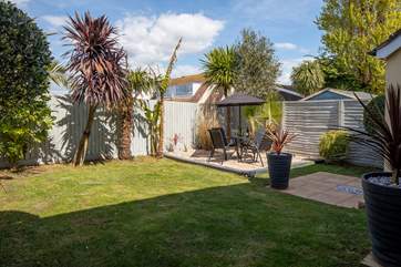 Plenty of grassed area for the little ones to roll around and enjoy the space and freedom of their own private back garden.