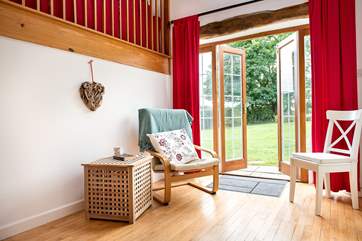 The spacious hallway provides more places to sit and enjoy the setting.