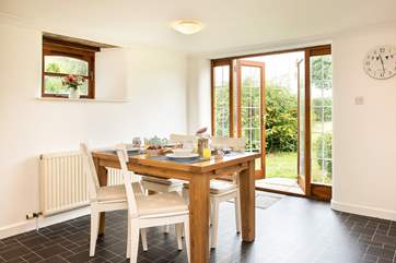 Double doors overlook the owners' garden which you are welcome to wander around.