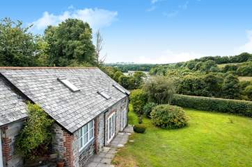 The owners' garden sits to the side of the cottage - which you are welcome to wander around, but you have your own private area to sit out.