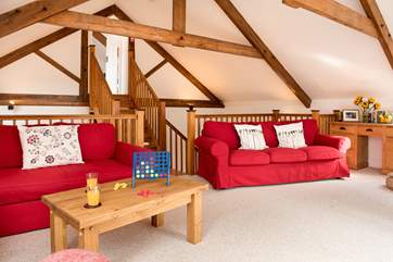 Plenty of room for everyone to chill out and relax in the sitting-room.