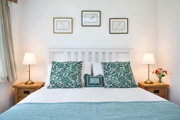 Beautiful bedroom 1 has a super comfy bed.