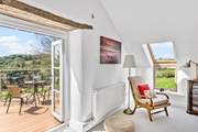 You are sure to spend many an hour enjoying the wonderful views from the balcony.