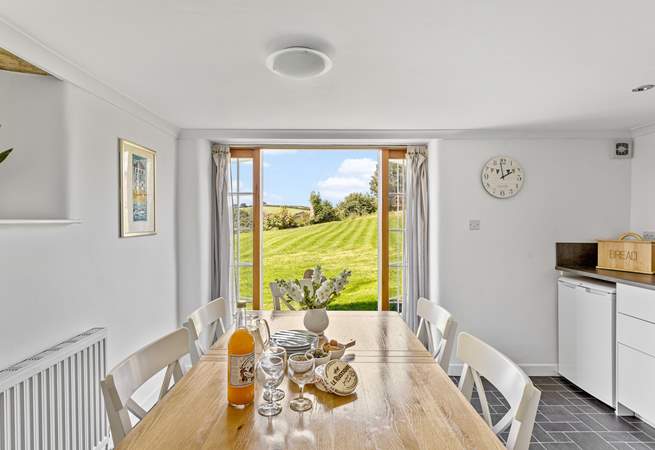 Double doors overlook the owners' garden which you are welcome to wander around.