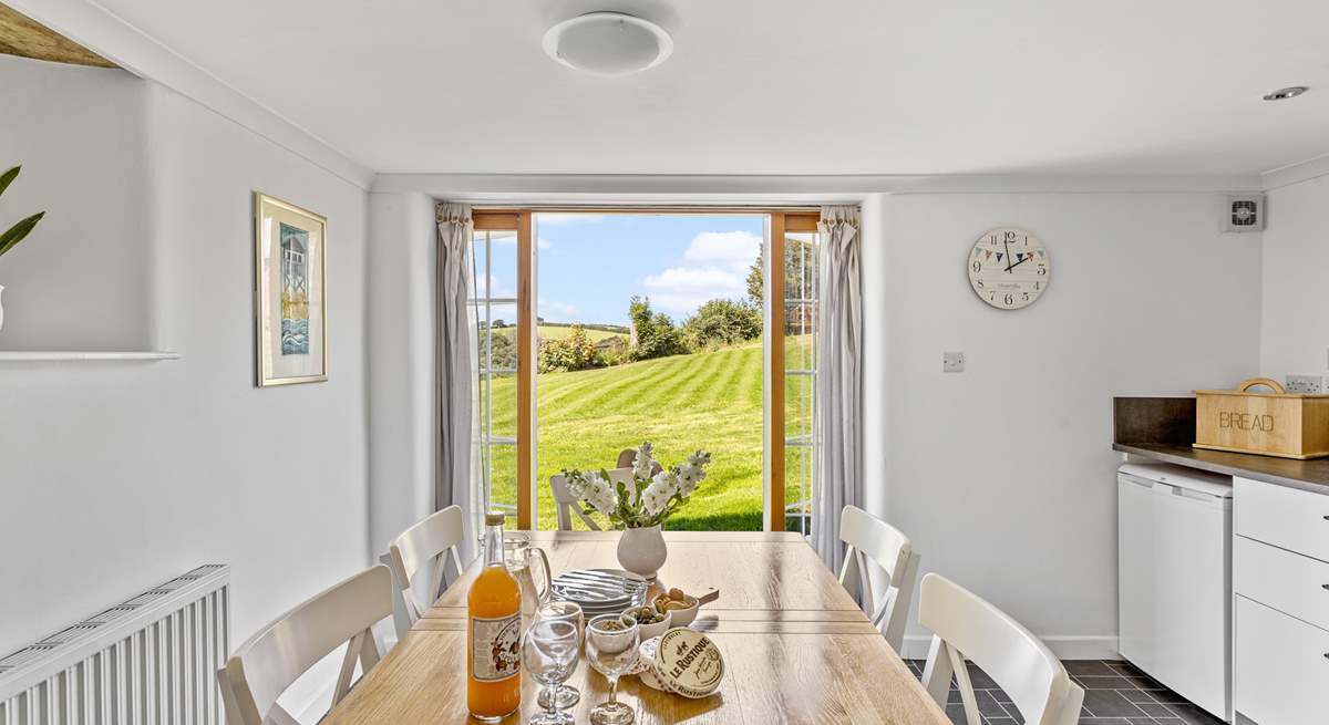 Double doors overlook the owners' garden which you are welcome to wander around.