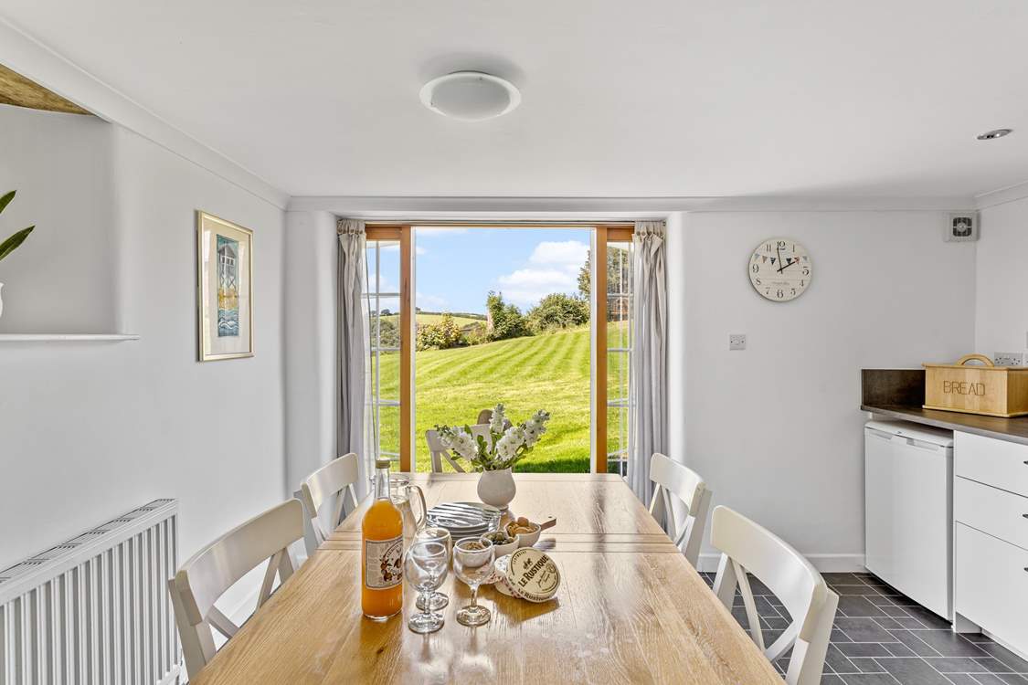 Double doors overlook the owners' garden which you are welcome to wander around.