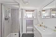 The stylish shower-room on the ground floor, next to the kitchen/dining-room.