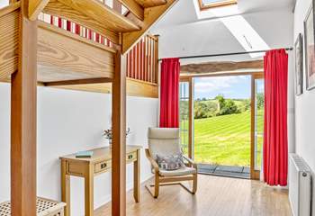 The spacious hallway provides another place to sit and enjoy the setting.