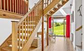 The entrance hall has a wonderful sense of space - the main staircase leads up to the sitting-room and bedroom 3. Bedrooms 1, 2 and the shower-room lead off via the stairs on the right. - Thumbnail Image