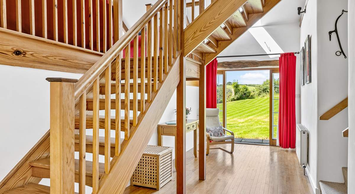 The entrance hall has a wonderful sense of space - the main staircase leads up to the sitting-room and bedroom 3. Bedrooms 1, 2 and the shower-room lead off via the stairs on the right.