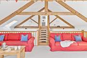 Please take care of children around the bannisters in the sitting-room. Bedroom 3 can be seen at the top of the stairs.