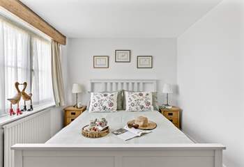 Beautiful bedroom 1 has a super comfy bed.