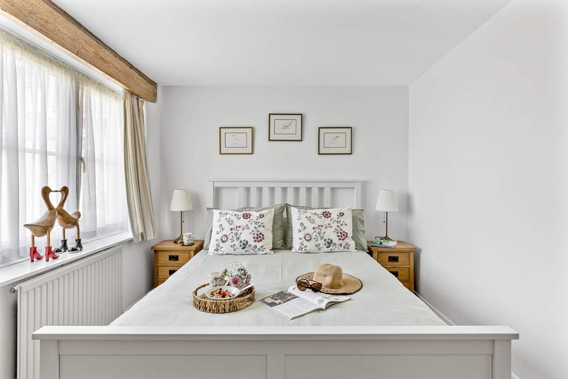 Beautiful bedroom 1 has a super comfy bed.