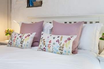 There are beautiful throws, cushions and soft furnishings throughout the cottage.