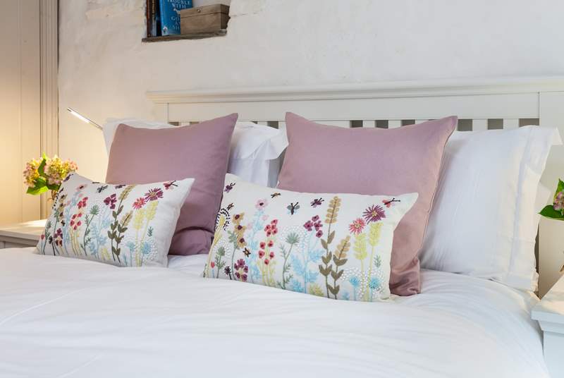 There are beautiful throws, cushions and soft furnishings throughout the cottage.