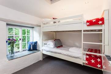 The bunk bedroom is perfect for the children, and has a fabulous window seat.