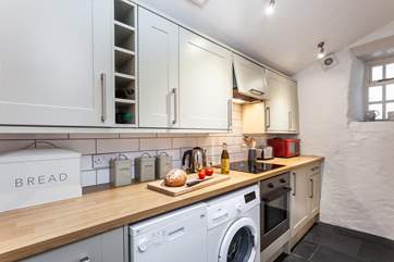 It's very easy to rustle up a fabulous meal with produce found in the village, or at local markets. (there are two steps leading up into the kitchen from the dining area).