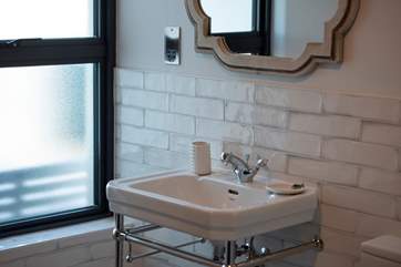 Oh and the bathroom has a traditional style sink.