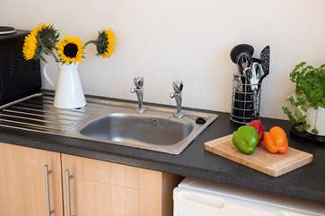 The cabin has an additional kitchenette with mini oven, work-top space and even a washing machine!