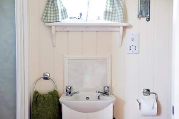 Hot shower, wash-basin and proper flushing loo - thou shalt not rough it here!