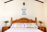 Plenty of room around the pretty bed - a rare glamping luxury even by our standards.