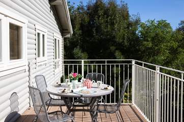 There are doors from the dining-area leading out onto the balcony, where you can sit back, relax and enjoy the peaceful setting.
