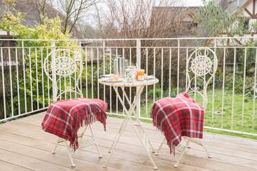 Start the day with a coffee and croissant in the Island sunshine