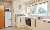 The light and airy kitchen overlooking the garden. - Thumbnail Image