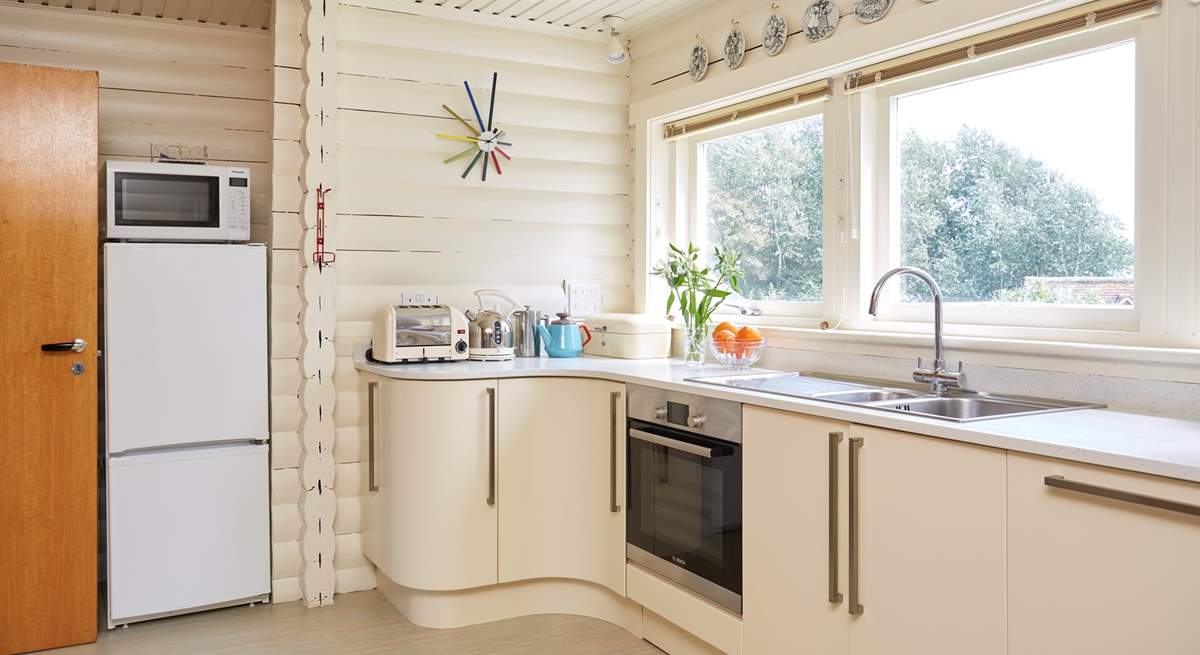 The light and airy kitchen overlooking the garden.