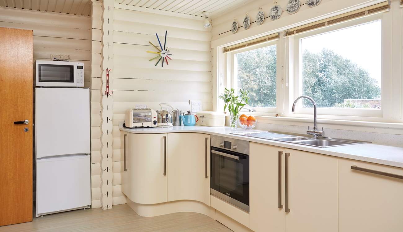 The light and airy kitchen overlooking the garden.