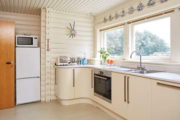 The light and airy kitchen overlooking the garden.