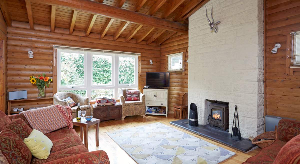 The comfortable living-room with a wood-burner and plenty of space to relax.