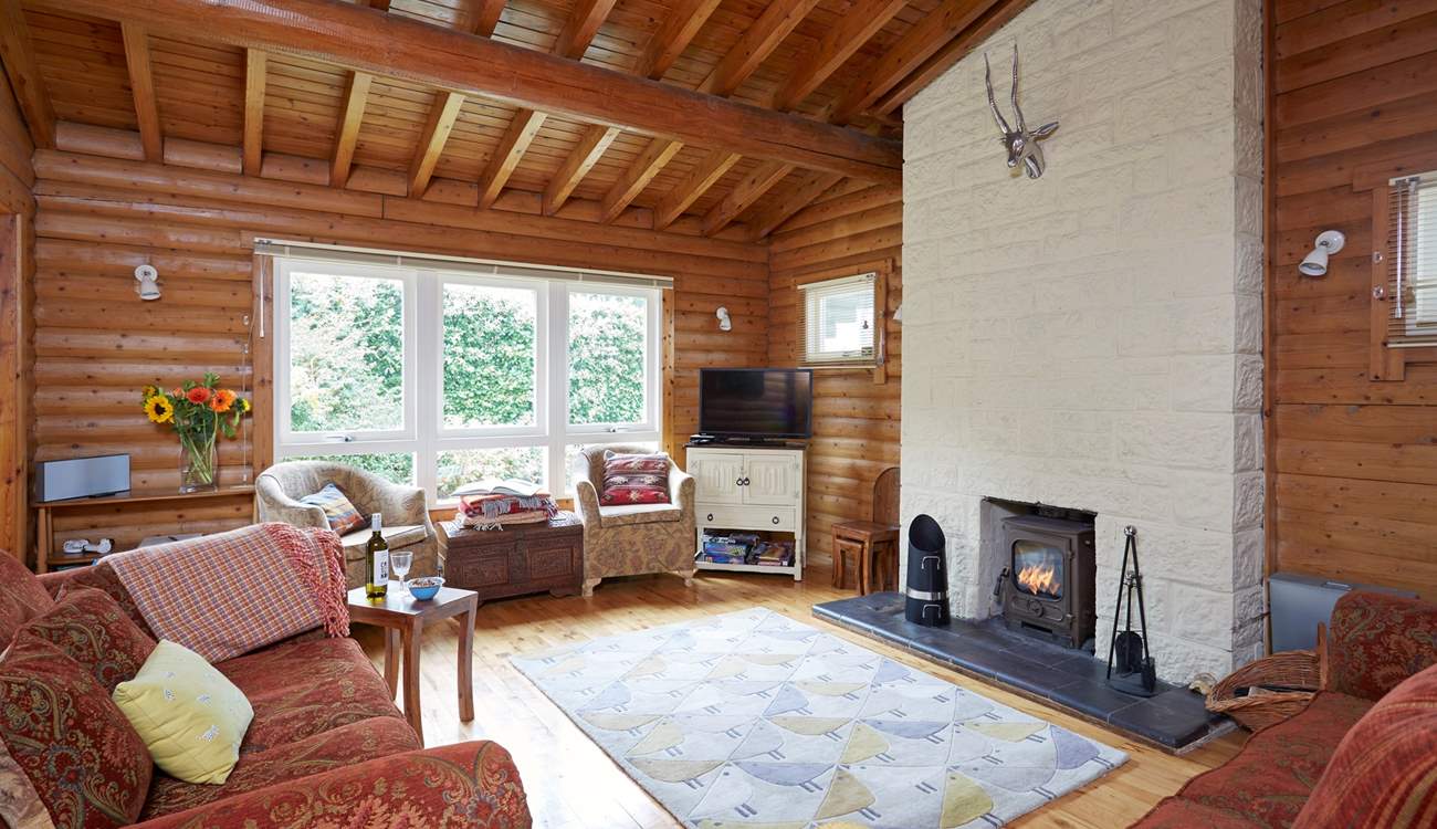 The comfortable living-room with a wood-burner and plenty of space to relax.
