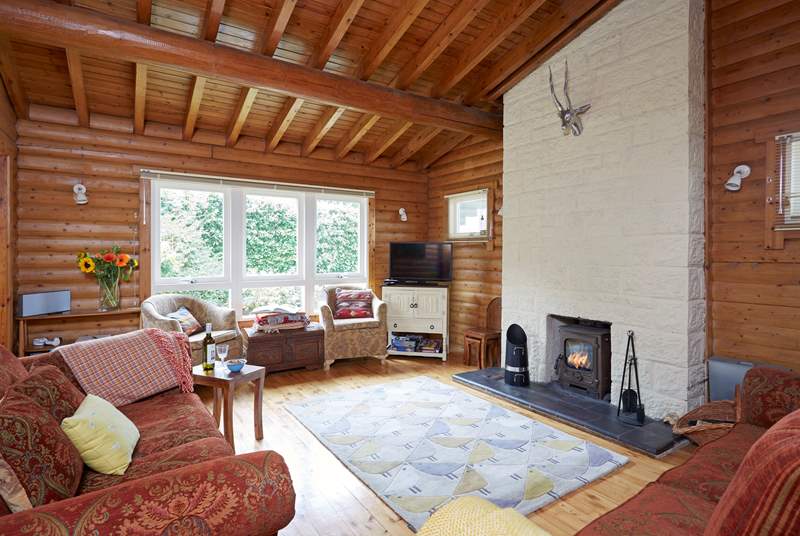 The comfortable living-room with a wood-burner and plenty of space to relax.