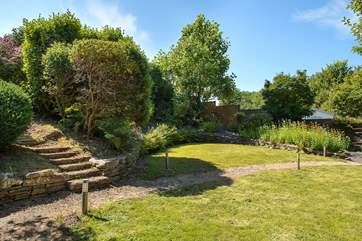 There are different areas to discover around the garden and a bubbling hot tub to boot!