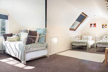 Bedroom 5 has twin beds and a day bed for flexilbility.