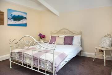 There's a pretty bedstead for the double bed in bedroom 4...
