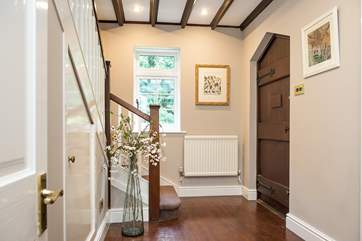 The entrance hall provides a warm welcome.